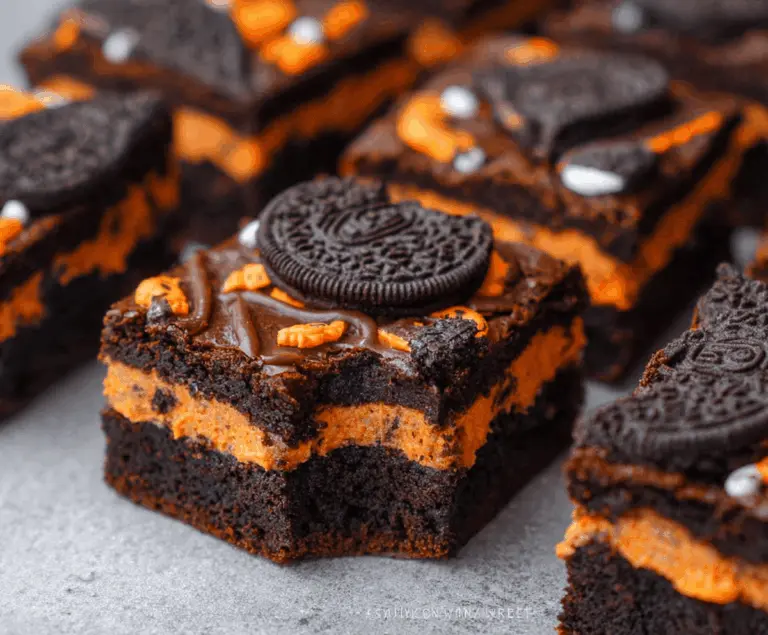 Delicious Halloween Oreo Brownies with festive Halloween decorations and colorful candy toppings