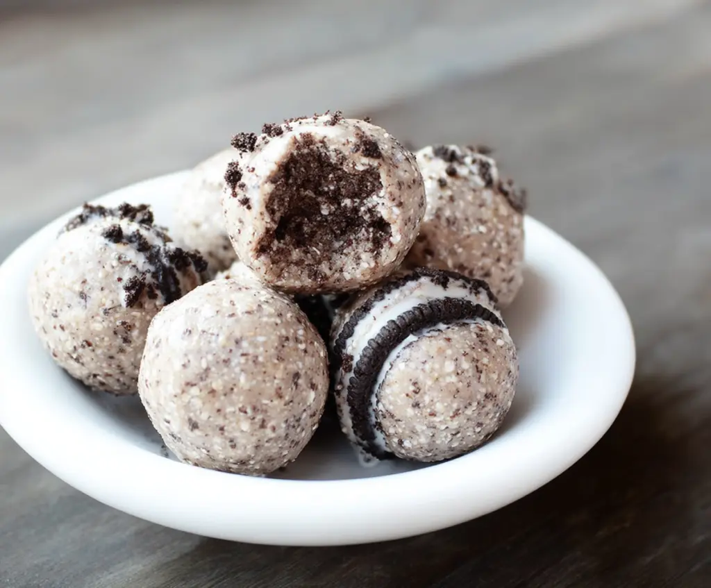 Healthy Oreo protein balls, a nutritious snack with oats, protein powder, and crushed Oreos.