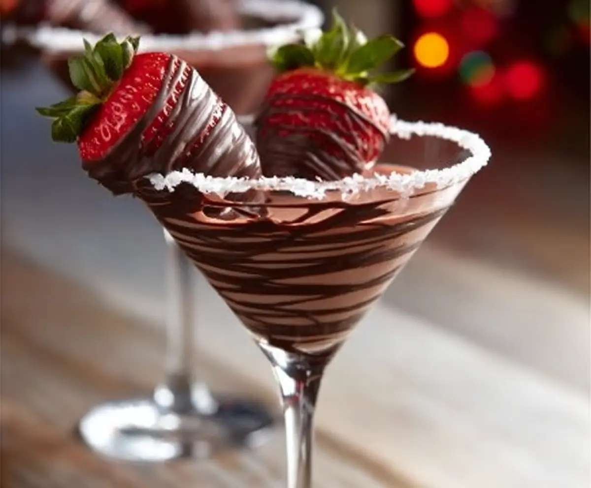 Elegant Chocolate Covered Strawberry Martini with fresh strawberries and rich chocolate drizzle