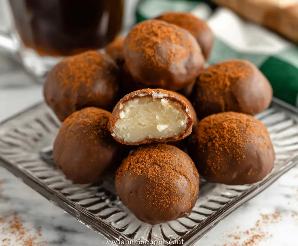 Delicious Irish Potato Candy with coconut, mashed potatoes, and a chocolate coating, showcasing a traditional Irish sweet treat.