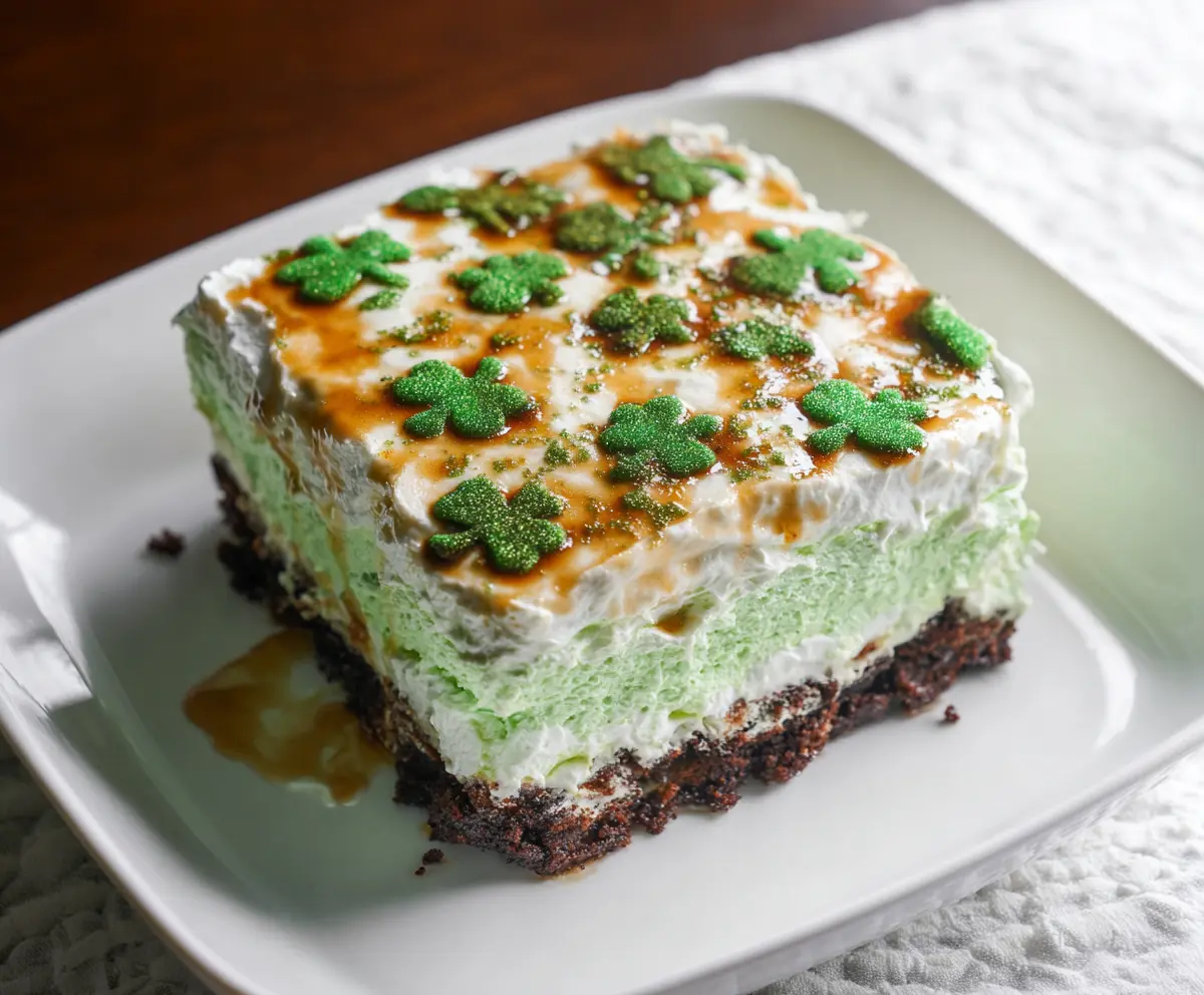 Delicious St. Patrick's Day Shamrock Lasagna Dessert with vibrant green layers and festive decoration.